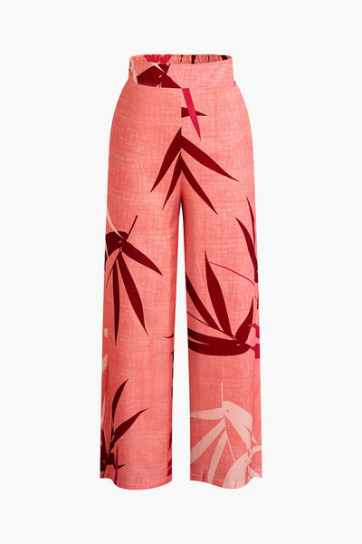 Tweedelige set met cropped top met strikbandjes en wijde broek met bamboebladerenprint