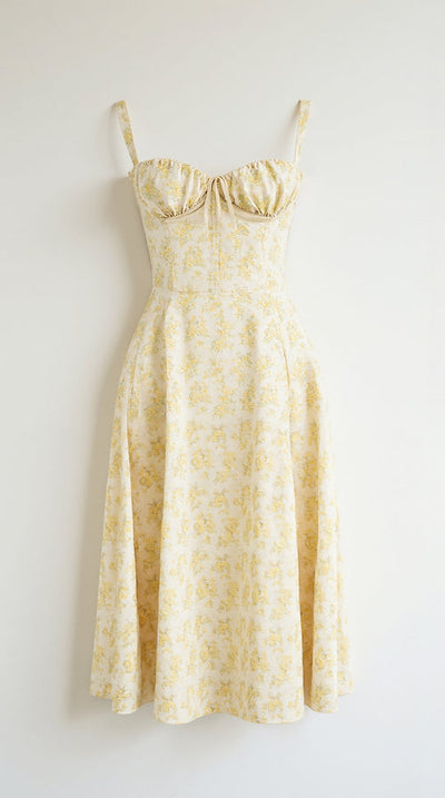 Elegante midi jurk zonder mouwen met bloemenmotief