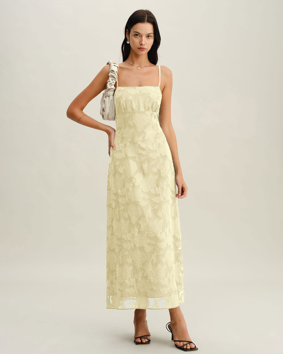 Maxi jurk met spaghettibandjes en elegante slip stijl