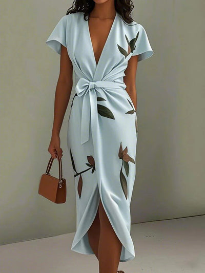 Elegante midi overslagjurk met bladprint v hals en korte mouwen
