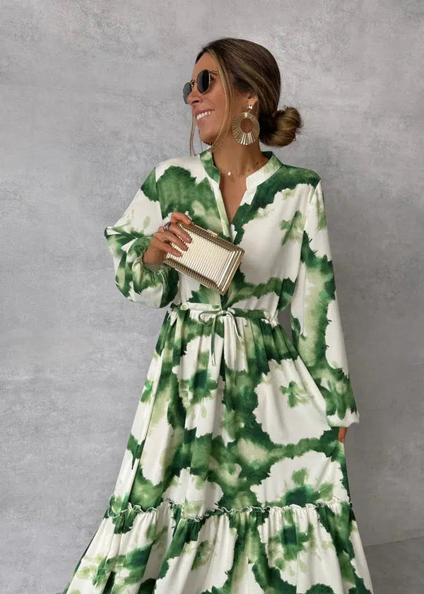 Lange damesjurk met lange mouwen V-hals en elegante vloeiende stijl