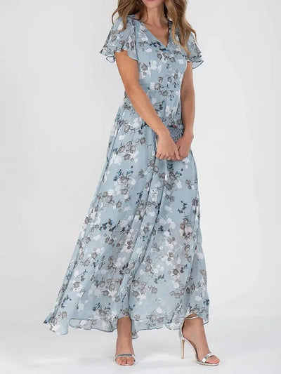 Lange zomerse maxi jurk met V hals en korte sierlijke mouwen