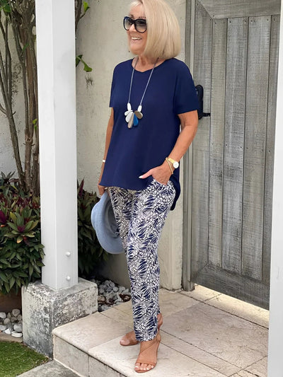 Vrouwenset met korte mouwen blouse en broek met print in zomerse stijl