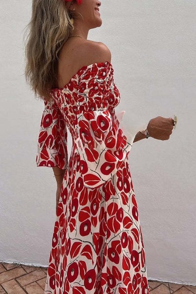 Lange damesjurk met bloemenprint en elastische halslijn voor zomerse gelegenheden