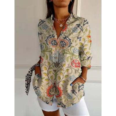 Vrouwelijke bloemenblouse met stijlvolle knopen