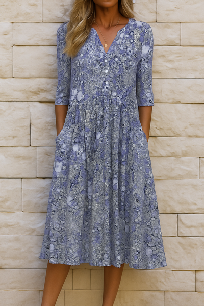 Elegante jurk met V hals en korte mouwen in midi lengte