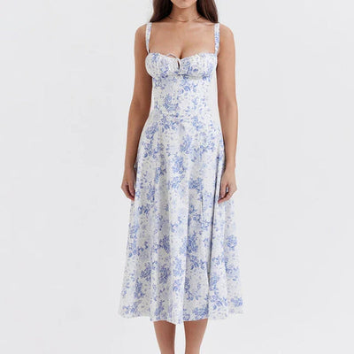 Vrouwelijke midi zomerjurk met bloemenmotief en fijne bandjes