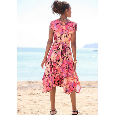 Zomerse jurk met asymmetrische rok strikdetail en puntige zoom