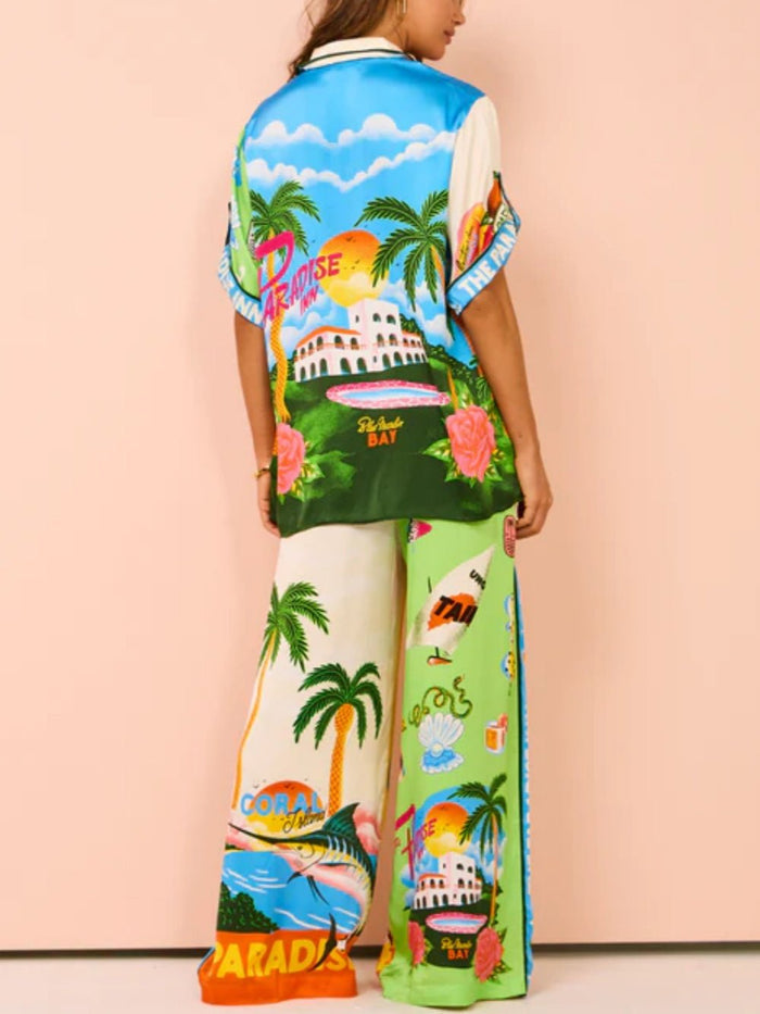 Tweedelige zomerset met wijde blouse en broek met strandprint