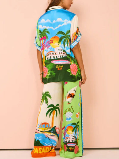 Tweedelige zomerset met wijde blouse en broek met strandprint