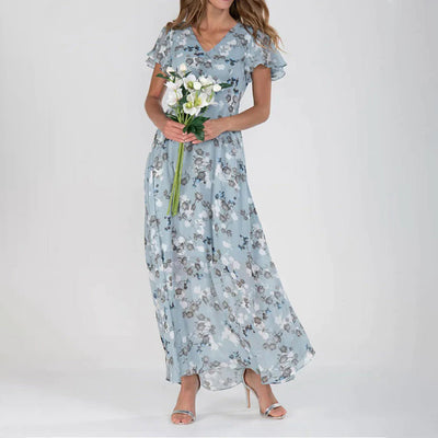 Lange damesjurk met bloemenprint en korte vlindermouwen voor een romantische zomerlook