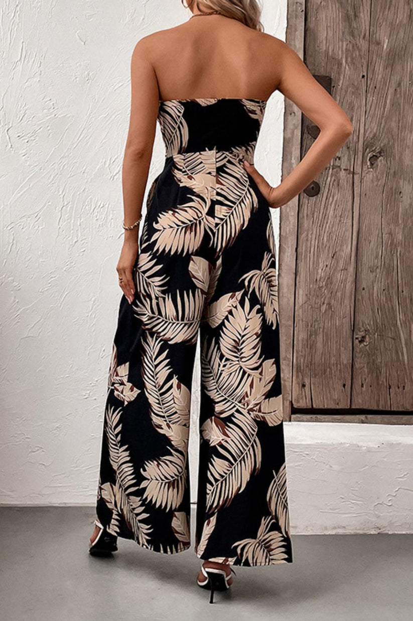 Straploze dames jumpsuit met bladprint en wijde pijpen voor een zomerse look