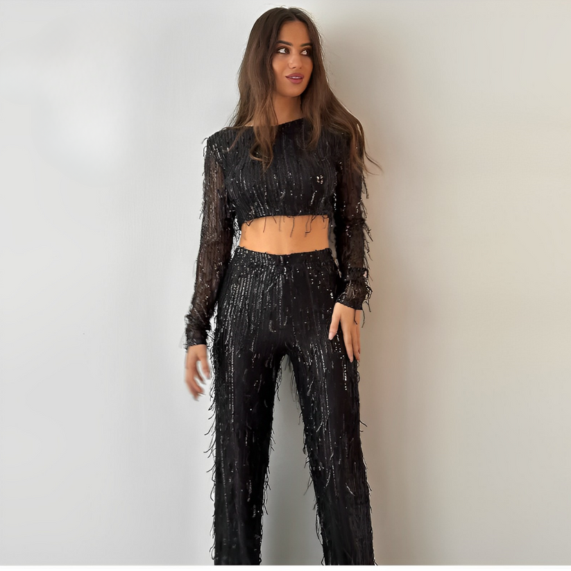 Glinsterende avondset met cropped top en lange mouwen broek voor een opvallende look