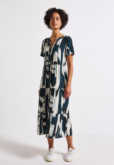 Korte mouw midi jurk met grafisch dessin en knoopdetail voor stijlvolle look