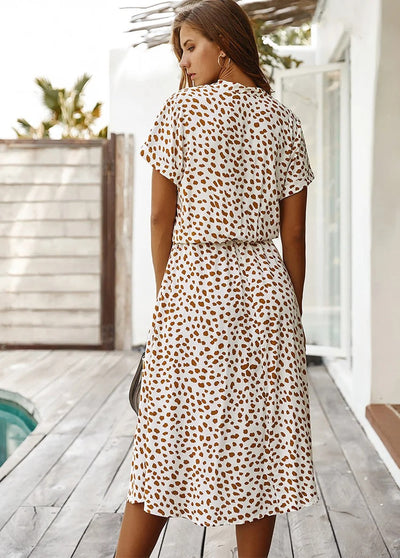 Stijlvolle dames midi jurk met korte mouwen voor zomerse dagen
