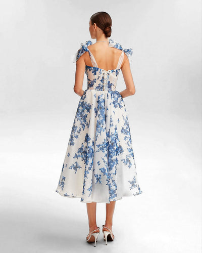 Zomerse midi jurk met bloemenprint en fijne bandjes