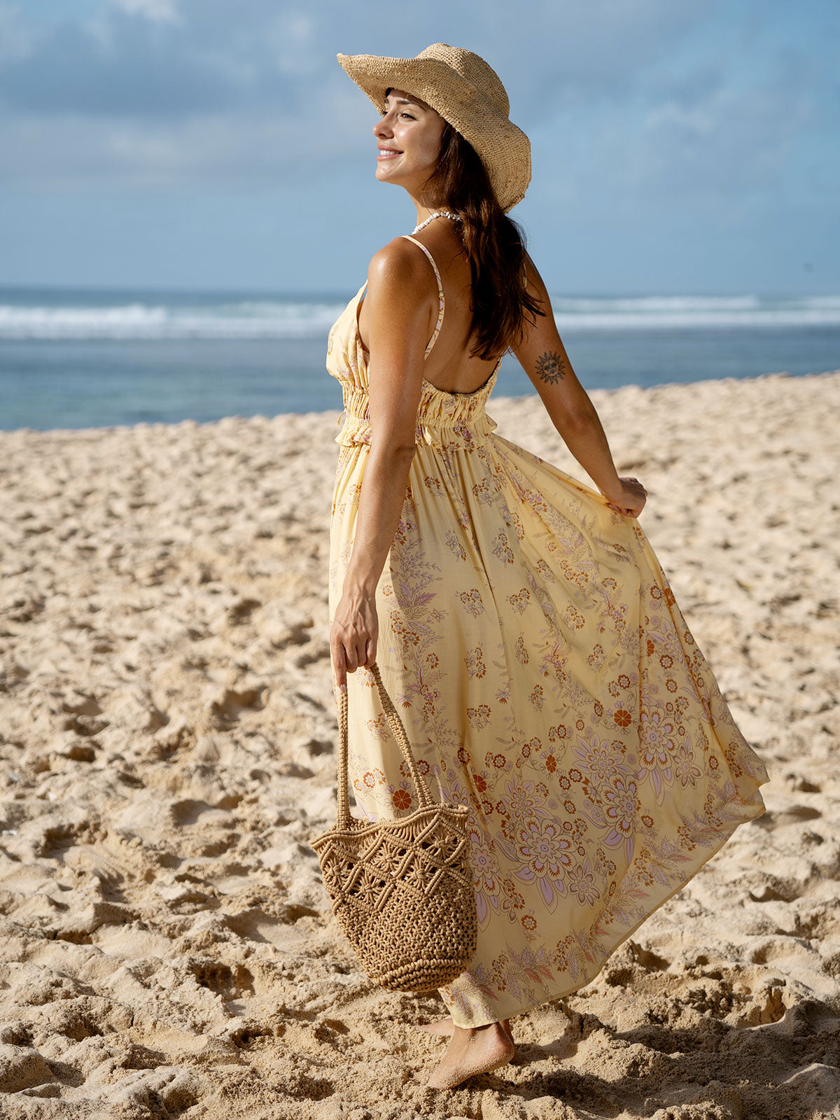Mouwloze strandjurk met strikdetail in maxi lengte
