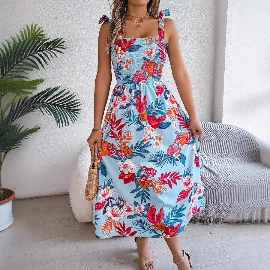 Zomerse lange jurk met bloemenprint en smalle bandjes voor een elegante look