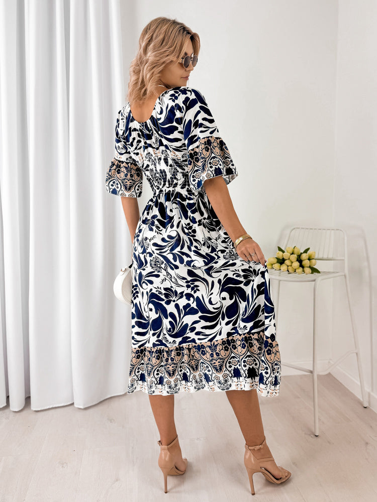 Trendy midi jurk met korte mouwen en V-hals in speelse stij