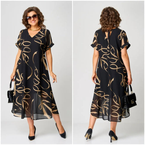 Elegante zomerse midi jurk met korte mouwen en luchtige uitstraling