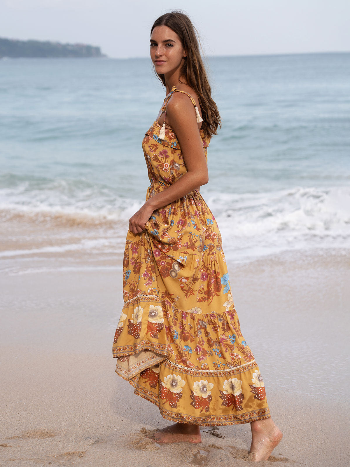 Lange strandjurk met bandjes en luchtige elegante uitstraling
