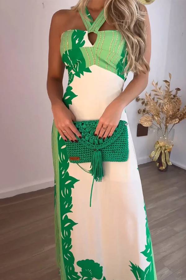Elegante maxi jurk met halternek en print