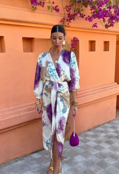 Elegante maxi jurk met diepe halslijn en lange mouwen