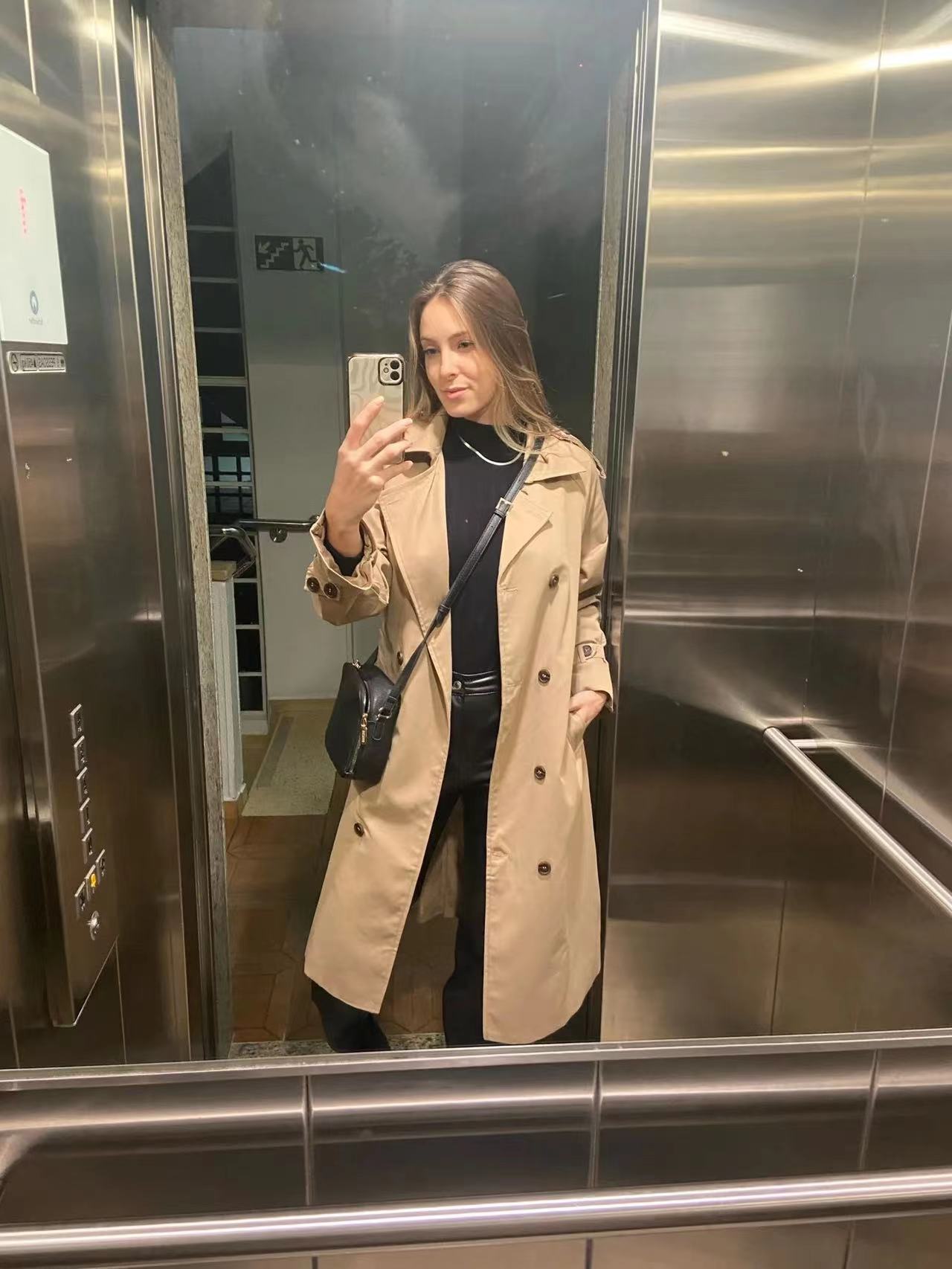 Lange dames trenchcoat met oversized pasvorm en dubbele knoopsluiting