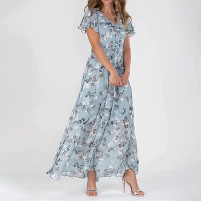 Lange damesjurk met bloemenprint en korte vlindermouwen voor een romantische zomerlook