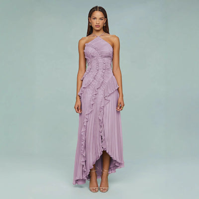 Elegante maxi halterjurk met plooien en speelse ruches