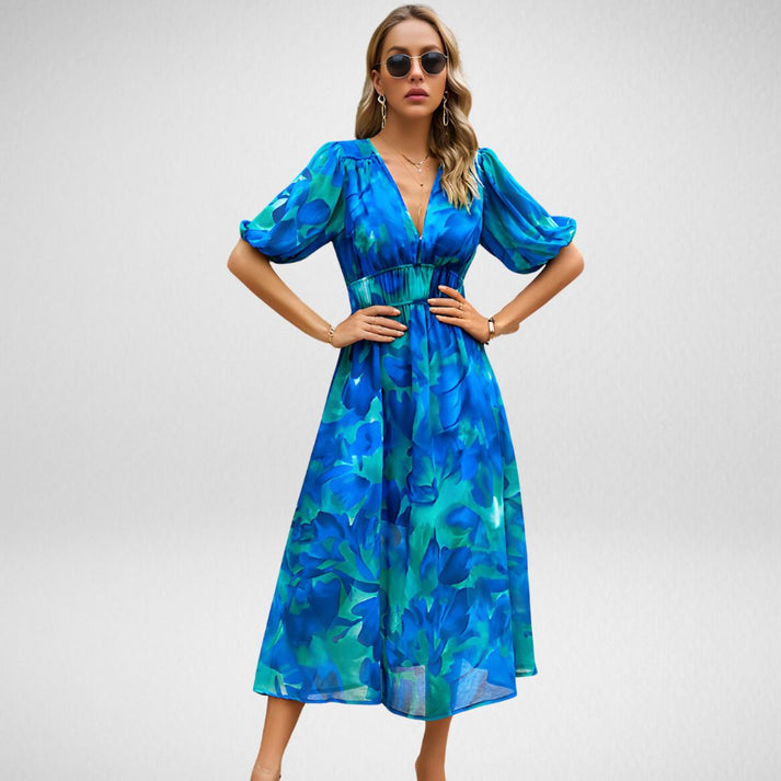 Maxi-jurk met abstracte print en elegante pofmouwen voor een opvallende look