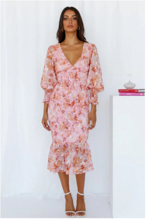Elegante midi jurk met lange mouwen en bloemenprint