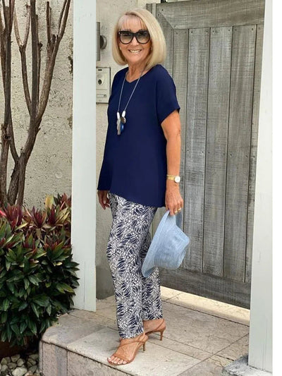 Vrouwenset met korte mouwen blouse en broek met print in zomerse stijl