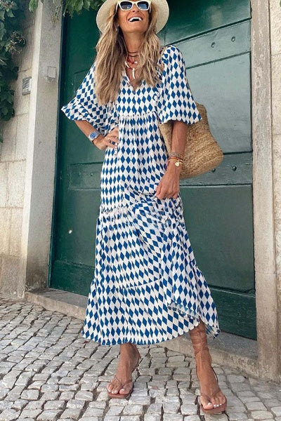 Midi jurk met pofmouwen en gelaagde rok voor een vrouwelijke look