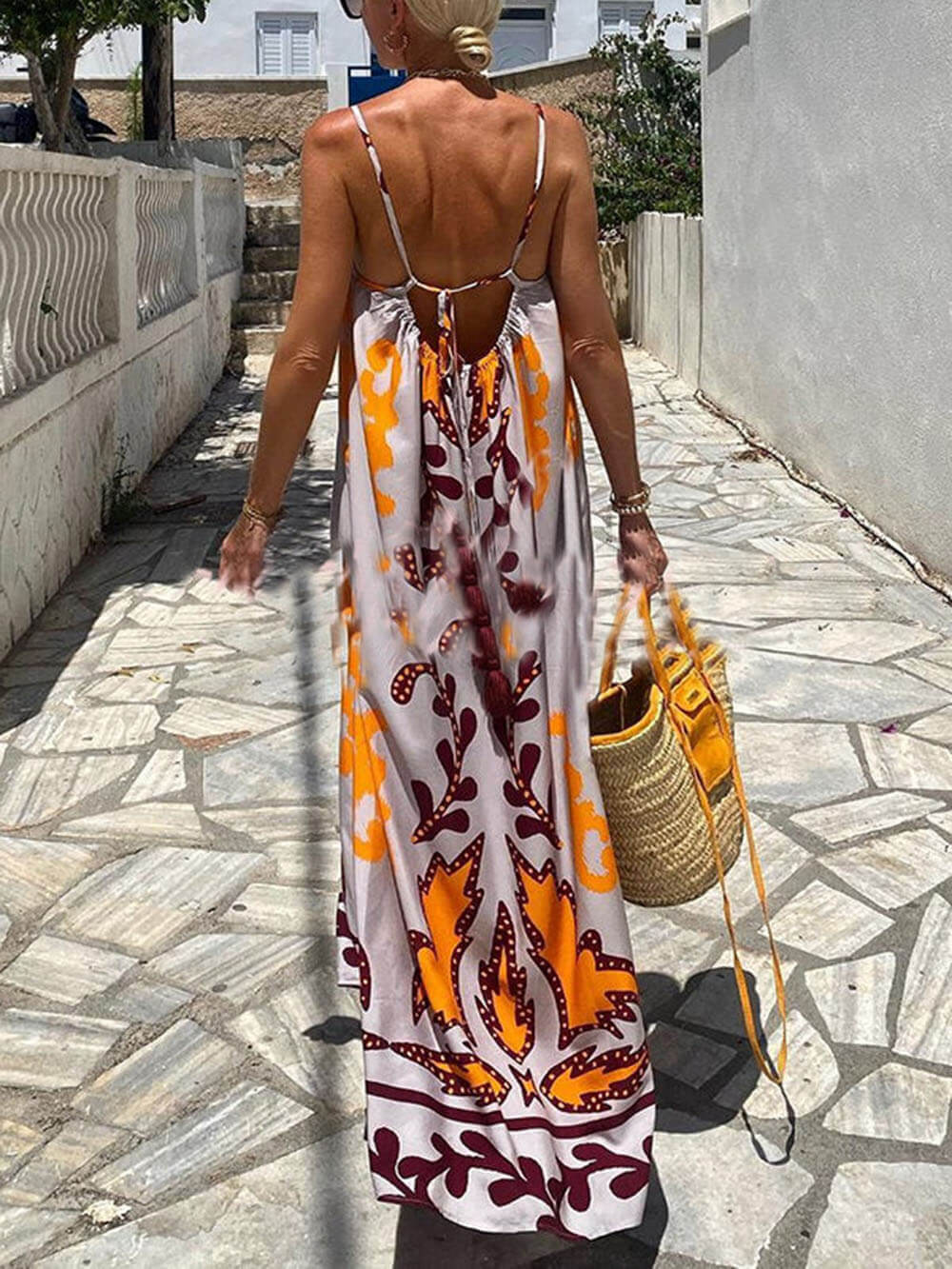 Losvallende maxi-jurk met etnische print en fijne bandjes voor een zomerse boho look