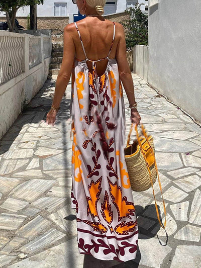 Losvallende maxi-jurk met etnische print en fijne bandjes voor een zomerse boho look