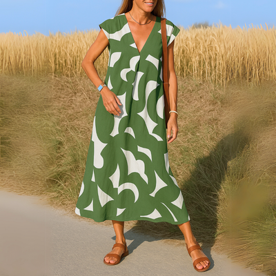 Elegante maxi jurk met korte mouwen en geometrisch patroon