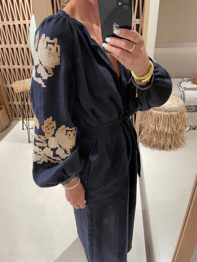 Elegante maxi jurk met lange mouwen en diepe v-hals voor een verfijnde uitstraling