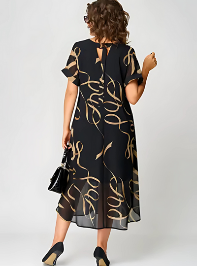 Elegante zomerse midi jurk met korte mouwen en luchtige uitstraling