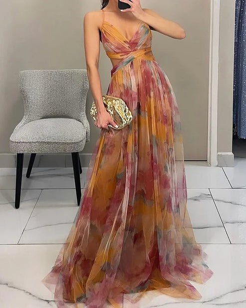 Romantische maxi jurk met dunne bandjes en zachte aquarelprint