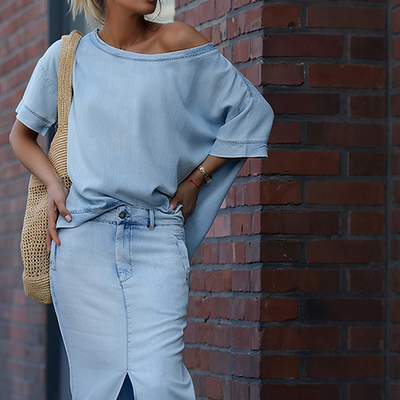 Dames set met asymmetrische top en maxi rok met split