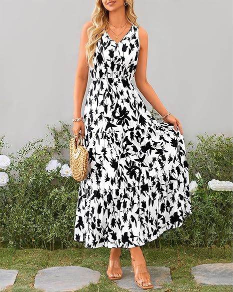 Elegante lange maxi jurk zonder mouwen met vloeiende uitstraling