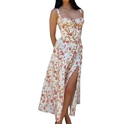 Vrouwelijke midi zomerjurk met bloemenmotief en fijne bandjes
