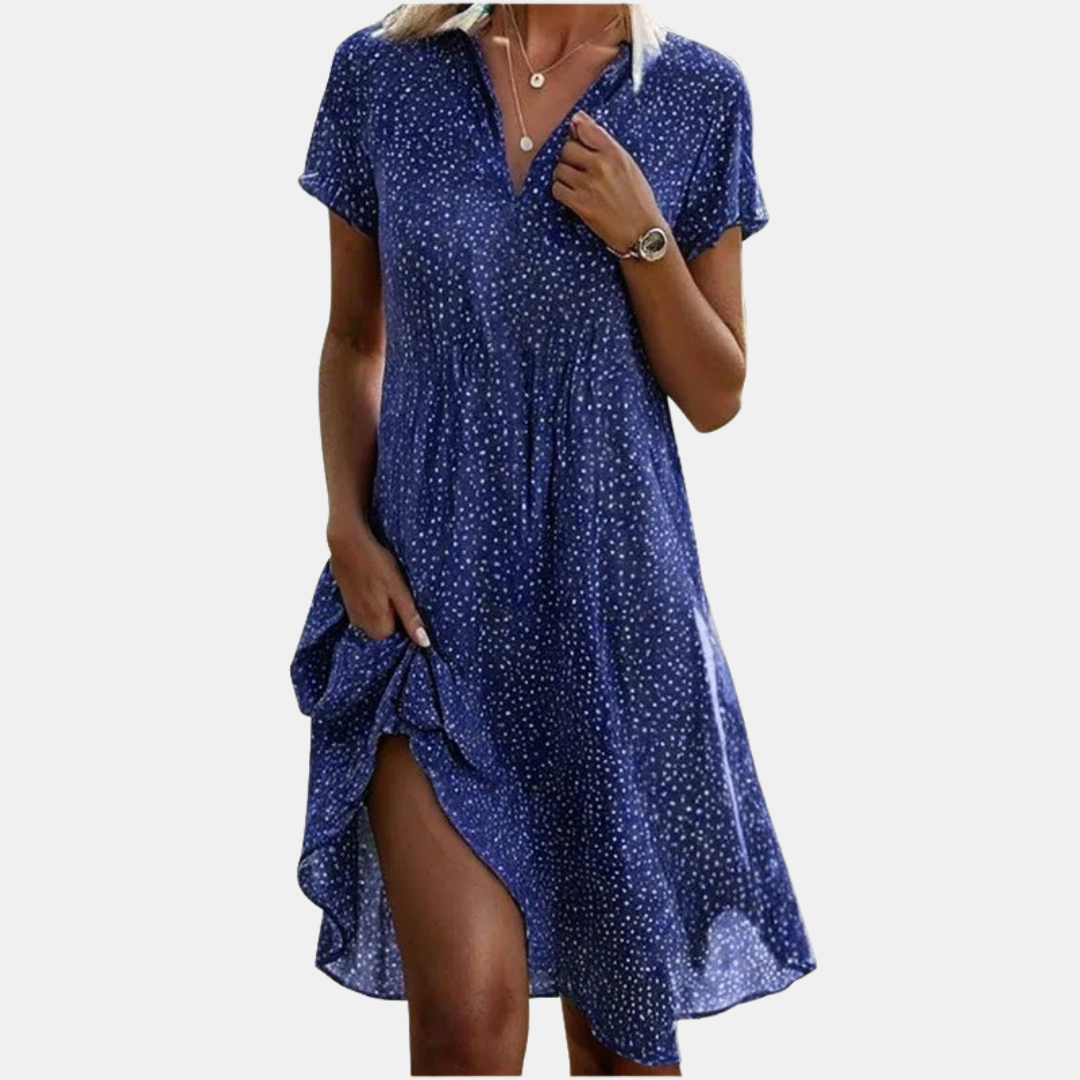 Luchtige zomerse jurk met stippenprint en elegante V-hals