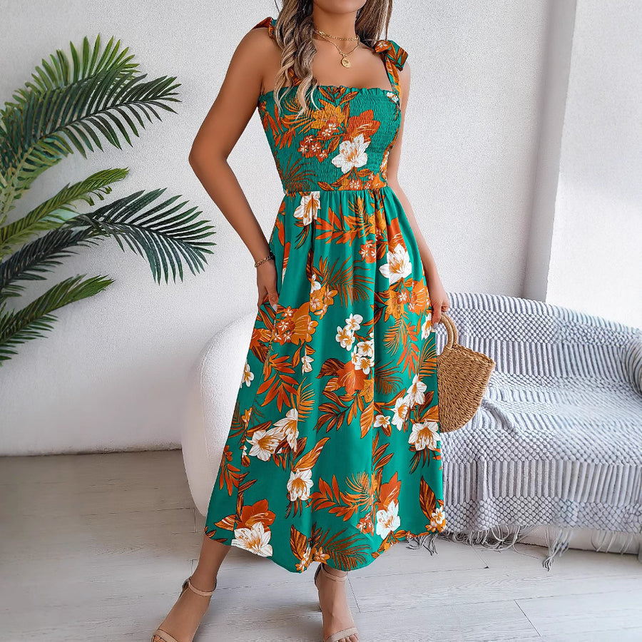 Zomerse lange jurk met bloemenprint en smalle bandjes voor een elegante look