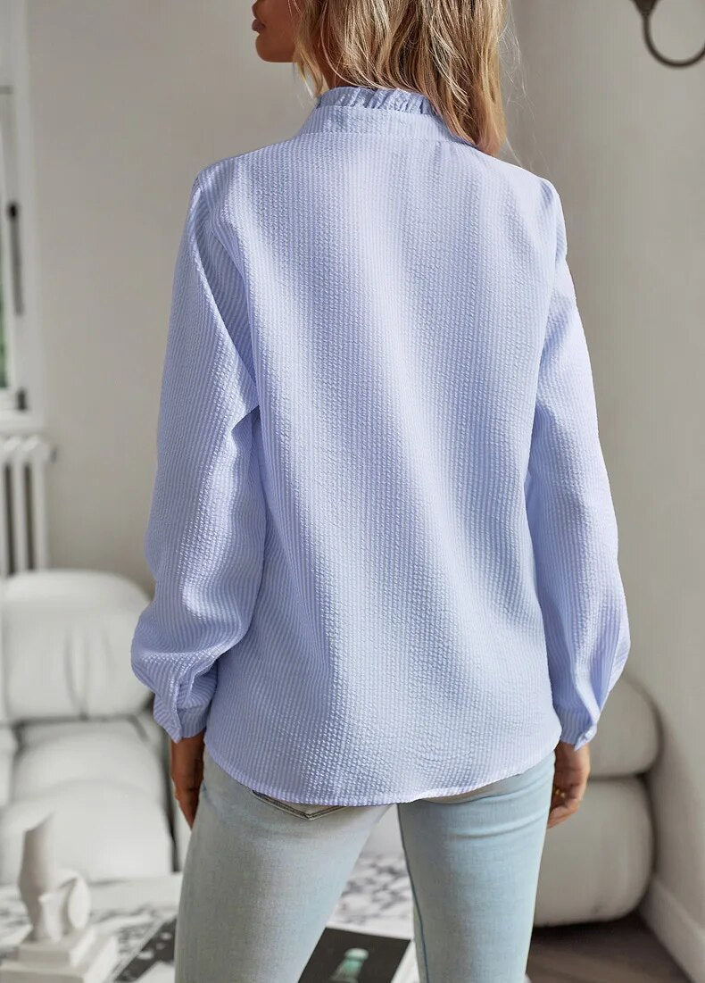 Elegante blouse met lange mouwen en ruches