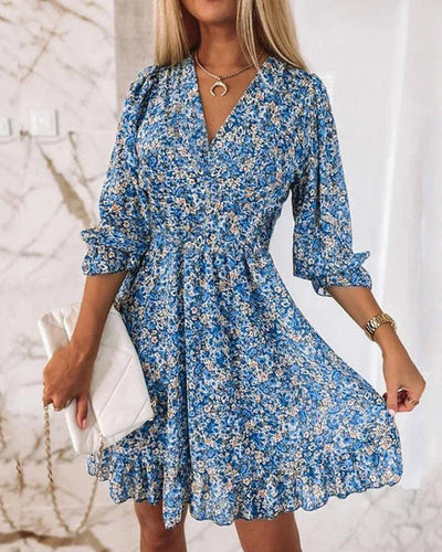 Luchtige zomer mini jurk met korte mouwen en bloemenprint