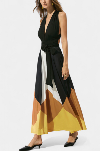 Lange elegante jurk met strik in de hals en open achterkant