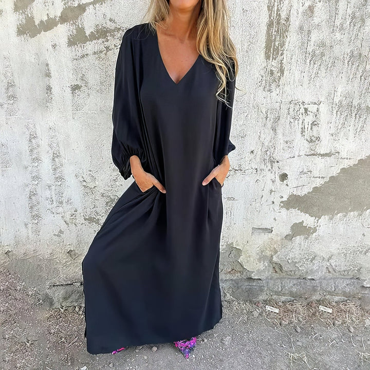 Lange boho jurk met lange mouwen en praktische zakken voor een ontspannen look