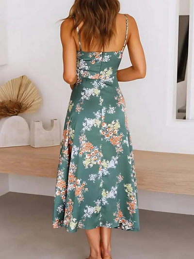 Lange damesjurk met bloemenmotief en fijne bandjes voor warme dagen
